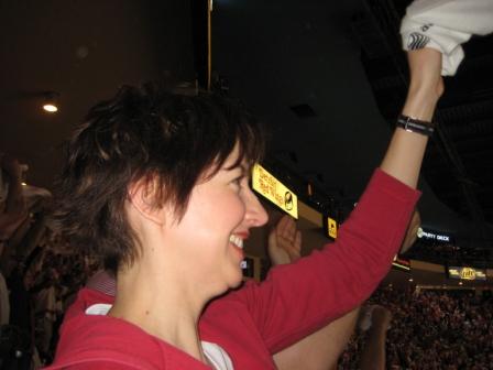 Alicia at JLA, waving her rally towel