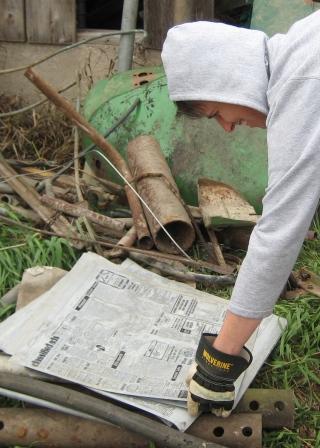 Betsy King with old Central Lake Torch printing plates