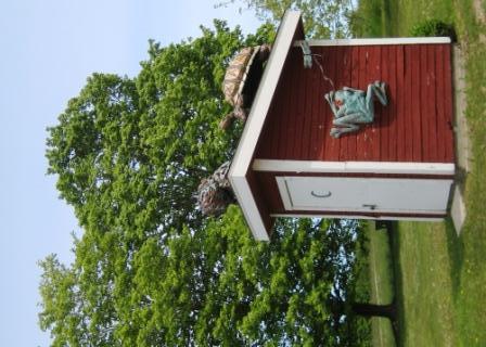 Critters on the wellhouse