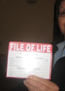 Diana Hein played hand model, holding up the sample File of Life pouch so I could take a picture of it for you.