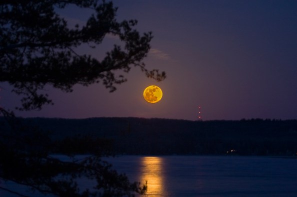 Perigee moon rises over Torch Lake