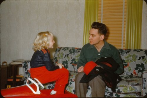 It looks like we were having a serious conversation - probably about being a responsible driver of that snazzy red vehicle.