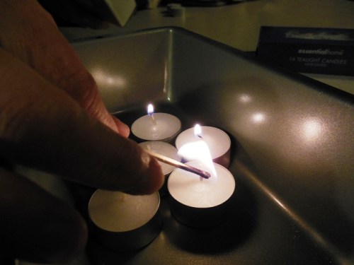 Lighting the tealights