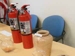 Fire extinguishers and turned wood vase